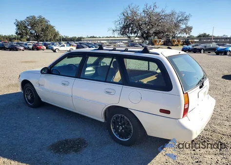 1997 Ford Escort Lx z USA, uszkodzony, nr VIN 3FALP15P3VR110638